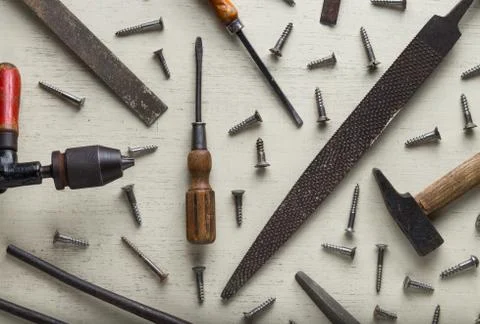 Construction tools set on wooden light background. Assortment instruments for Stock Photos