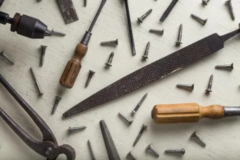 Construction tools set on wooden light background. Assortment instruments for Stock Photos