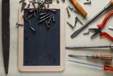 Construction tools set on wooden light background. Assortment instruments for Stock Photos
