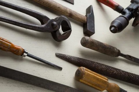 Construction tools set on wooden light background. Assortment instruments for Stock Photos