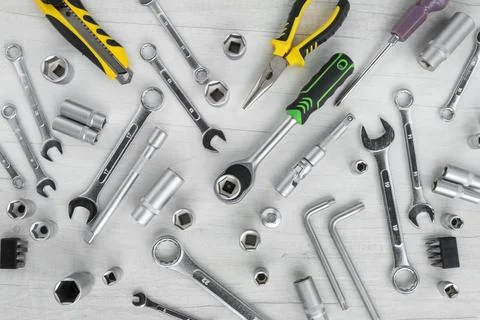 Construction tools on a white wooden table. A set of work tools Stock Photos