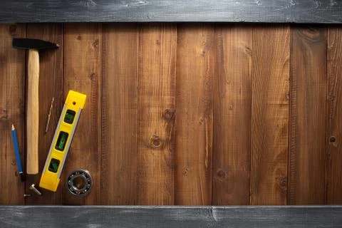 Construction tools on wooden  background Stock Photos