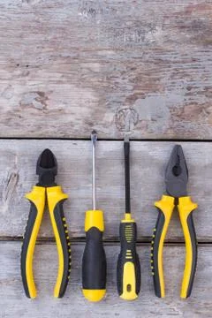 Construction tools on wooden background. Stock Photos