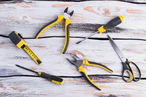 Construction tools on the wooden background. Stock Photos