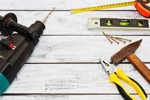 Construction tools on wooden surface with copyspace Stock Photos