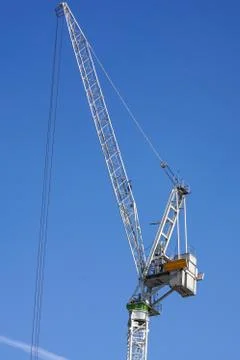 Construction tower crane against blue sky Stock Photos