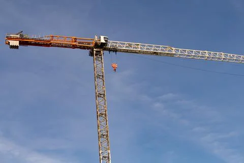 Construction tower crane against blue sky Stock Photos