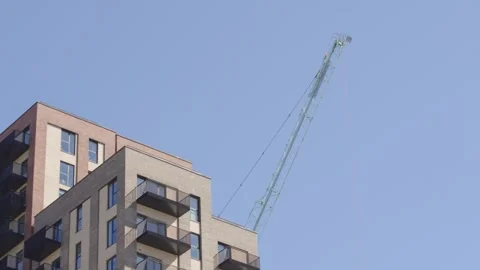 Construction Tower Crane Over Residential Apartment Building Constructing New Stock Footage 333634718