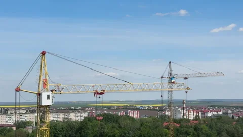 Construction tower cranes building a city district Stock Footage 340237966