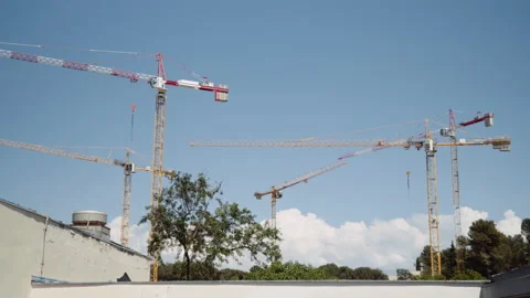 Construction tower cranes, wide static low angle shot. Stock Footage 132300904