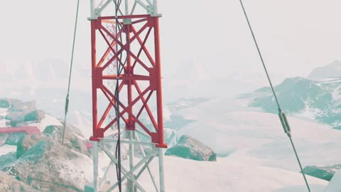 Construction of a tower on a snowy mountain in winter season Stock Footage 344159326