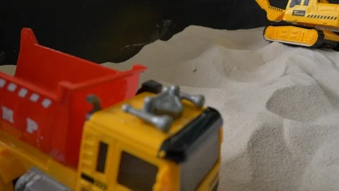 Construction toy in sand playground Stock Footage 94653073