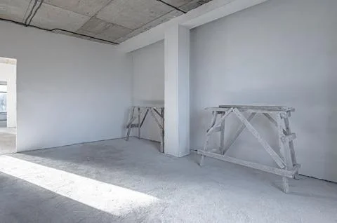 Construction trestles in a white empty interior. Stock Photos