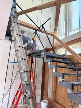 Construction is underway on new building that will feature metal support stairs Fotos de archivo