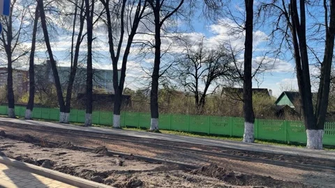 Construction of urban roads with the installation of new curbs  Stock Footage 334067856