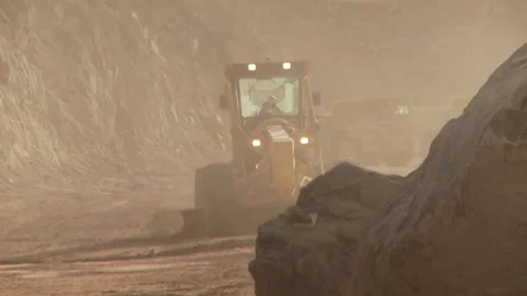 A construction vehicle working on a construction site Stock Footage 312400440