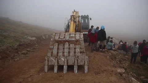 Construction vehicles are working to build roads in Rize. Stock Footage 148885367