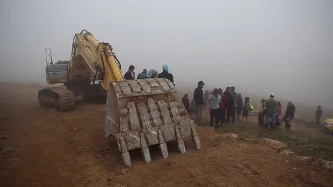 Construction vehicles are working to build roads in Rize. Stock Footage 148885422