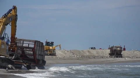 Construction vehicles on beach. Video stock 54299500