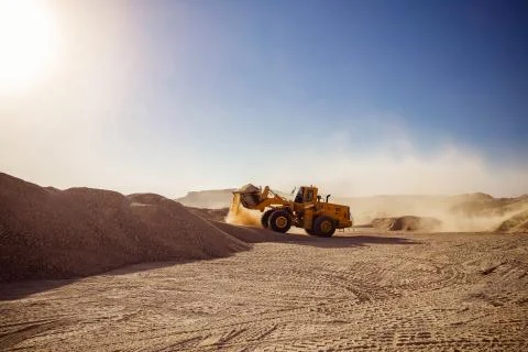 Construction Vehicles in Desert working Stock-Fotos