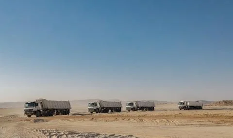 Construction Vehicles in Desert working Stock-Fotos