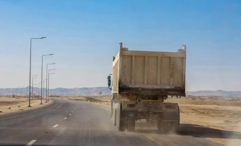 Construction Vehicles in Desert working Stock-Fotos