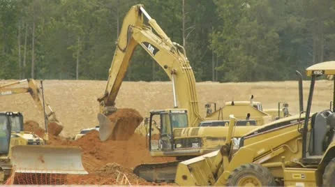 Construction Vehicles digging dirt Vídeo Stock 11140183