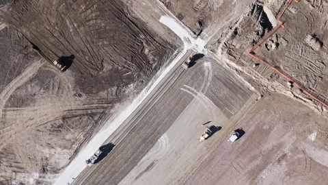 Construction Vehicles at Work on a New Road Development Project During Daytime Stock Footage 266937154
