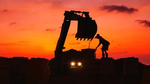 Construction Video At construction site close up The silhouette excavator is  Stock Footage 99129629