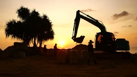 Construction Video At construction site The silhouette excavator is digging g Stock Footage 99128941