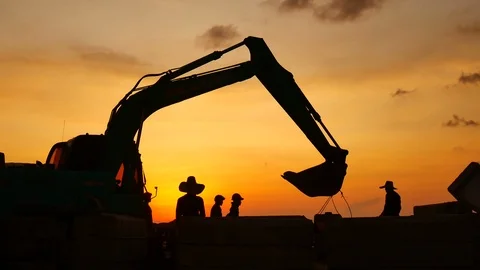 Construction Video At construction site The silhouette excavator is digging g Stock Footage 99129314