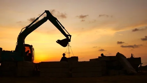 Construction Video At construction site The silhouette excavator is digging g Stock Footage 99129369