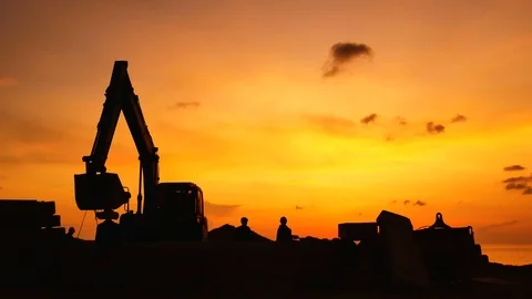 Construction Video At construction site The silhouette excavator is digging g Stock Footage 99129684