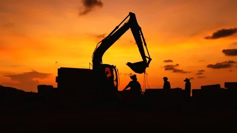 Construction Video At construction site The silhouette excavator is digging g Stock Footage 99129718