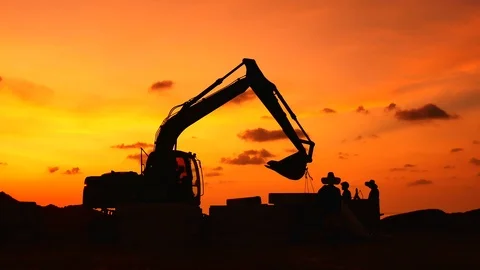 Construction Video At construction site The silhouette excavator is digging g Stock Footage 99129898