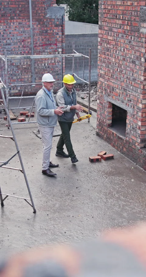 Construction, walking and men on tablet for building, planning and inspection Stock Footage 340990497