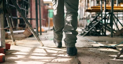 Construction, walking or legs on site with inspection, safety check or quality Stock Footage 337037720