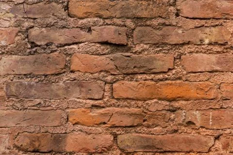 Construction of wall with texture of very old red bricks Stock Photos
