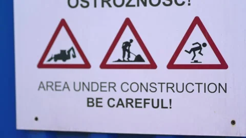 Construction warning sign indicating area under construction, captured in 4.. Stock Footage 283084612