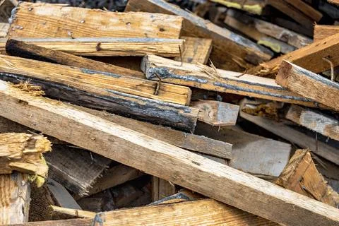 Construction waste after dismantling the formwork of a reinforced concrete fo Photos