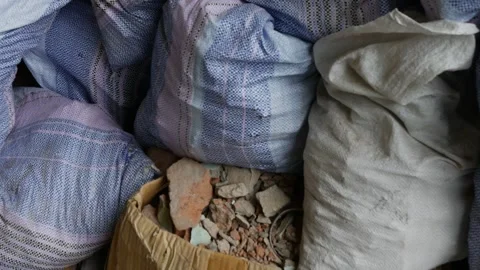 Construction Waste Bags and Rubble Cardboard Box Stock Footage 341917285