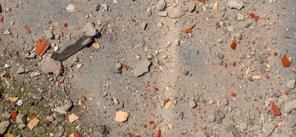 Construction waste close up. Broken bricks, demolition debris, and destruct.. Stock Photos