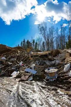 Construction waste dump. Environmental pollution from construction waste Stock Photos