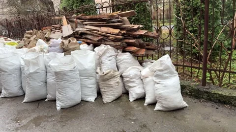 Construction waste growing near residential building Stock Footage 307721953