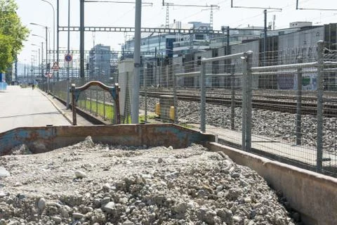 Construction waste next to train tracks Photos