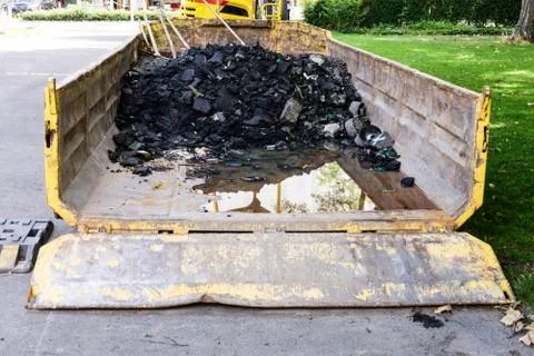 Construction waste in a skip Stock Photos