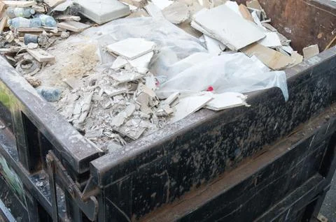 Construction wastes dump container Stock Photos