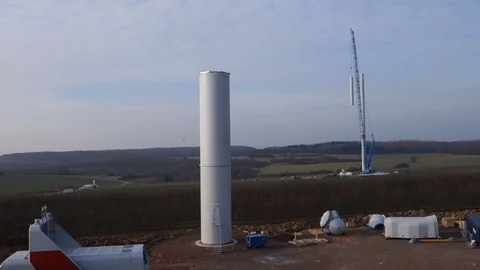 Construction of a wind power. Aerial shot from a drone in Germany. Video stock 73123305