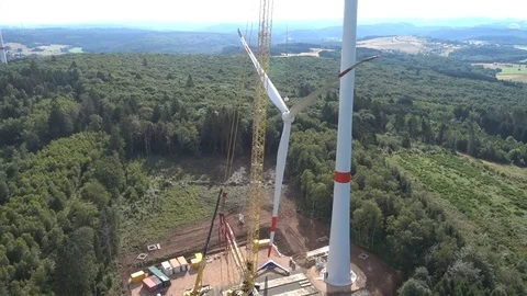 Construction of a wind power in Europe. View from drone. Video stock 73123667