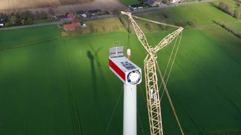Construction of a wind power generator.  Aerial drone view of a wind farm Видео 332875233
